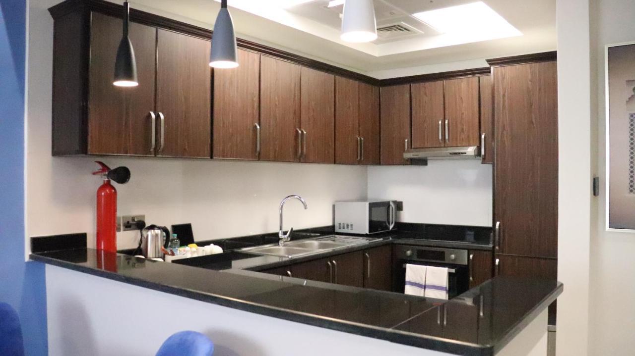 Al Riyadh Hotel Apartments Абу Даби Екстериор снимка