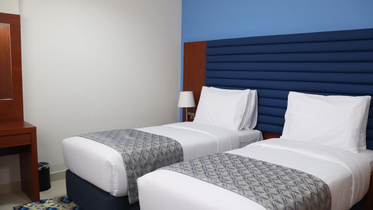 Al Riyadh Hotel Apartments Абу Даби Екстериор снимка