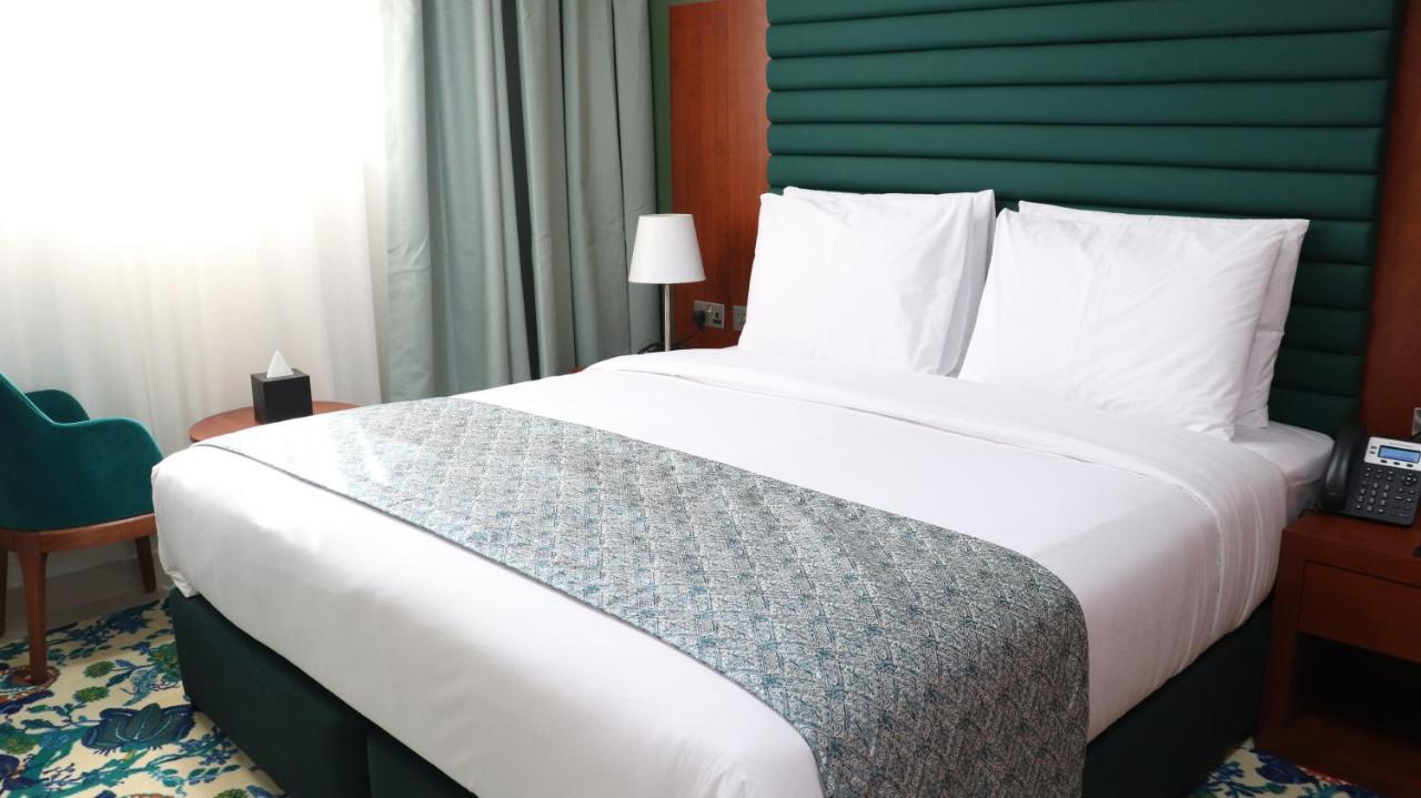 Al Riyadh Hotel Apartments Абу Даби Екстериор снимка