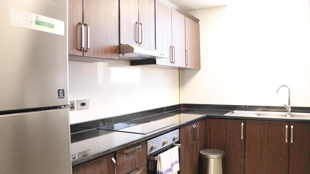 Al Riyadh Hotel Apartments Абу Даби Екстериор снимка