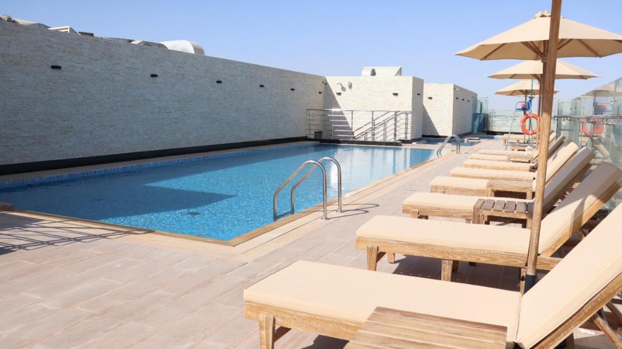 Al Riyadh Hotel Apartments Абу Даби Екстериор снимка
